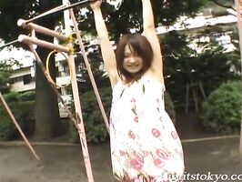 Ayumi Ayukawa Hot Asian model shows her tits in the kitchen