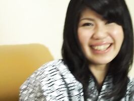 Asian Babe's Sensual Handjob Session on the Couch