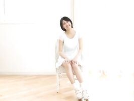 Erina Nagasawa Seductively Undresses in Sensual Solo Strip Tease