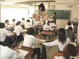 Naughty Asian Seduces Teacher in Steamy Classroom Encounter